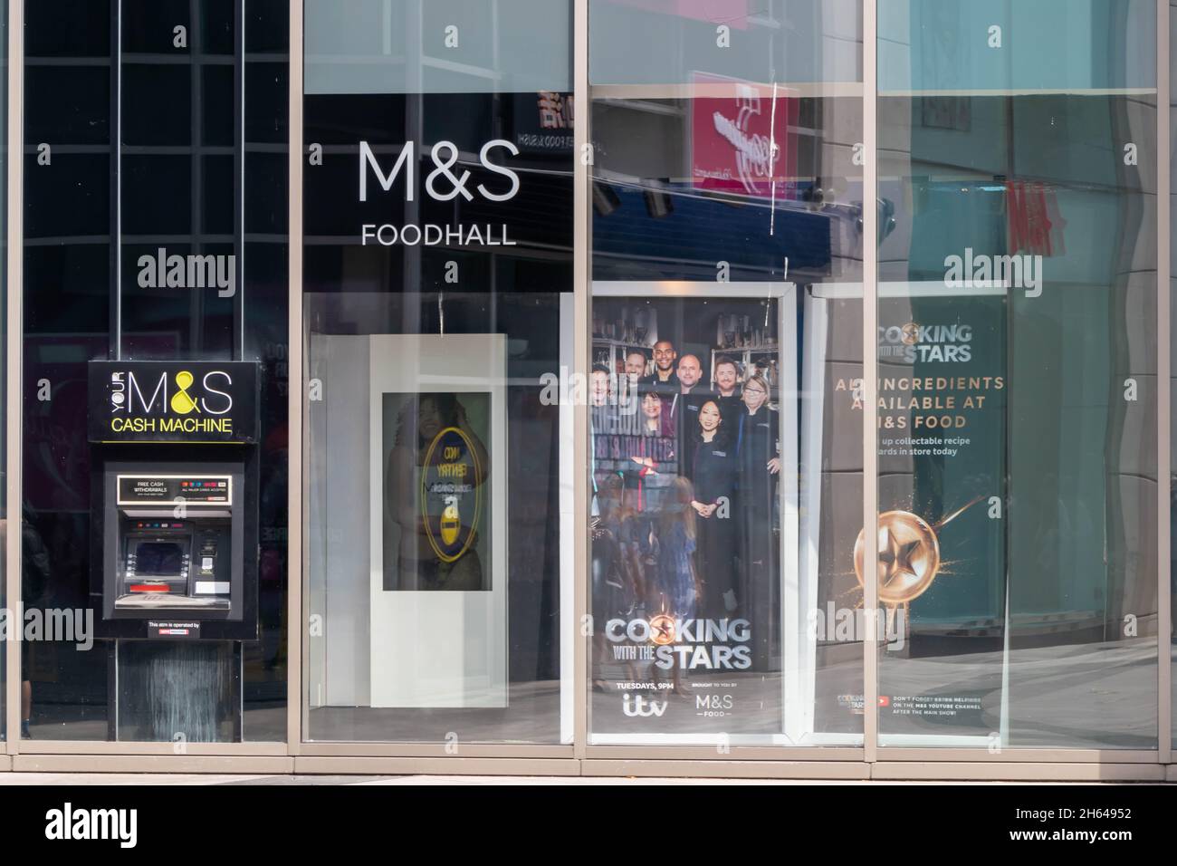 High Wycombe, England - July 21st 2021: Marks and Spencer's Foodhall amd cash machine. The store has a presence in most large towns. Stock Photo