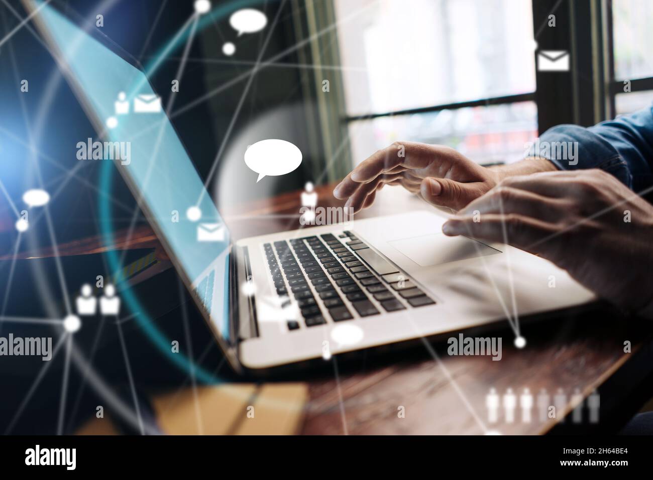 Close-up photo of male hands with laptop. Man working remotely at home. Concept of networking or remote work. Global business network. Stock Photo