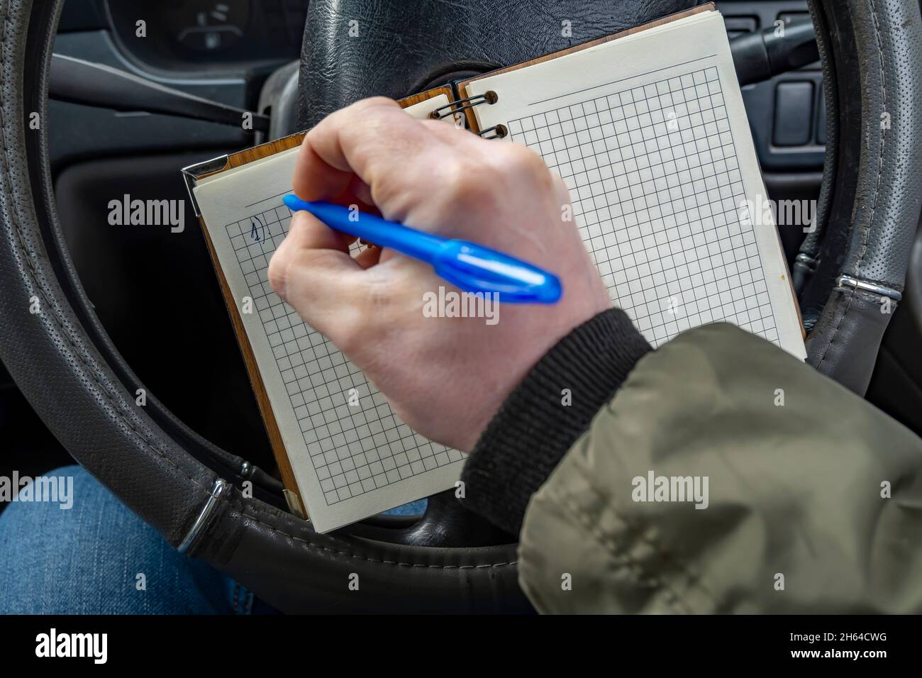 Driver Making Notes Inside book page blank hi-res stock photography and images - Alamy