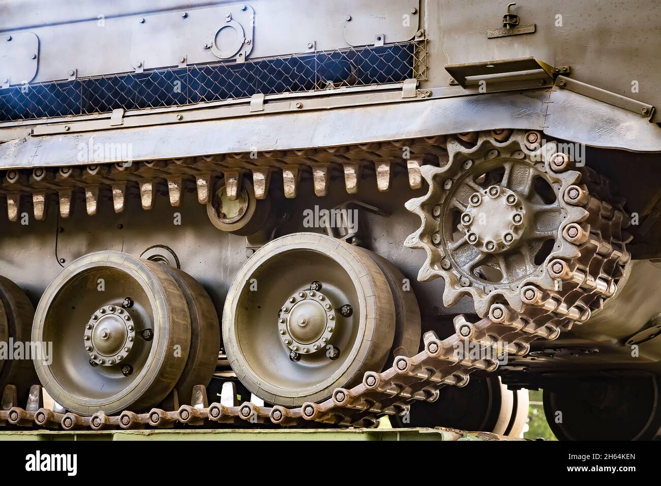 Closeup of green caterpillar track of the tank or Buk missile system standing. Stock Photo