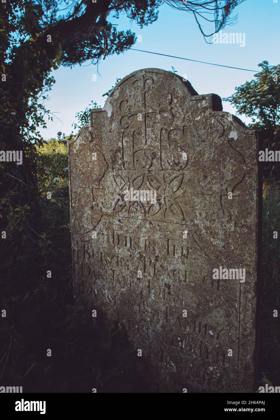 Old tombstone in a cemetery Stock Photo Alamy