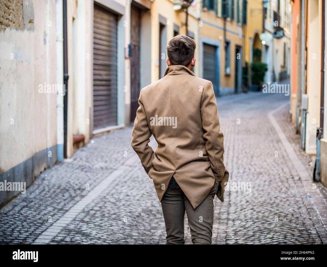 Trendy young man walking hi-res stock photography and images - Alamy