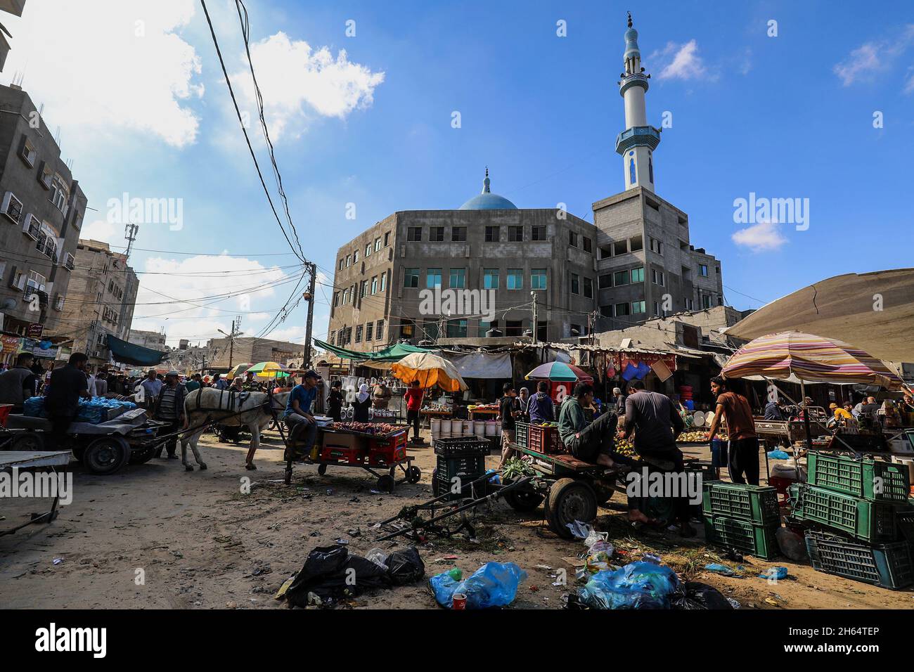 Palestinians shop at the Rafah Central Market in Rafah in the southern Gaza Strip, on November 04, 2021. Stock Photo