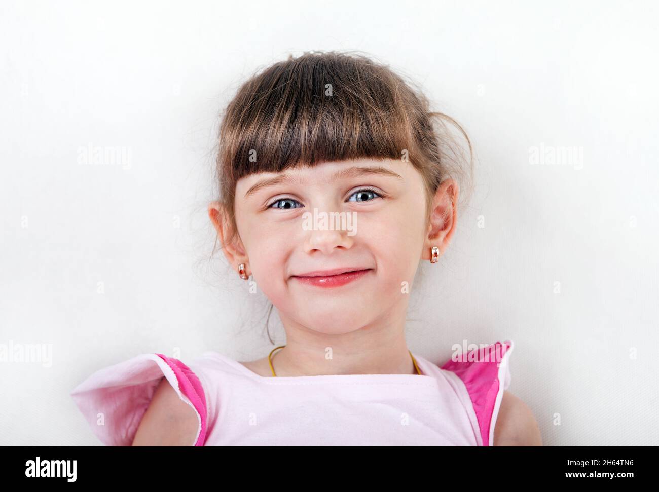 Cheerful Little Girl Portrait on the White Wall Background Stock Photo ...