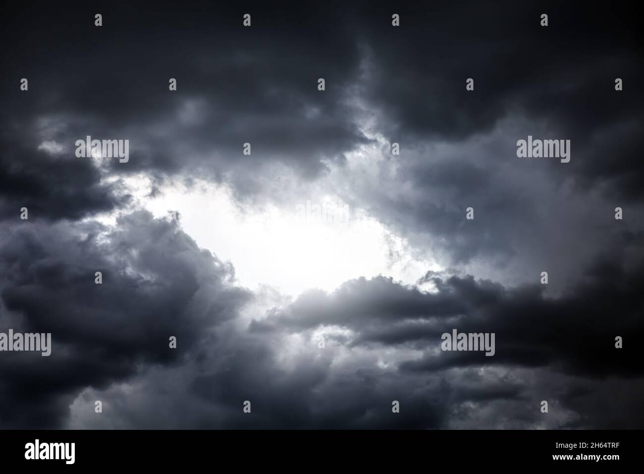 Light in the Dark and Dramatic Storm Clouds Stock Photo - Alamy