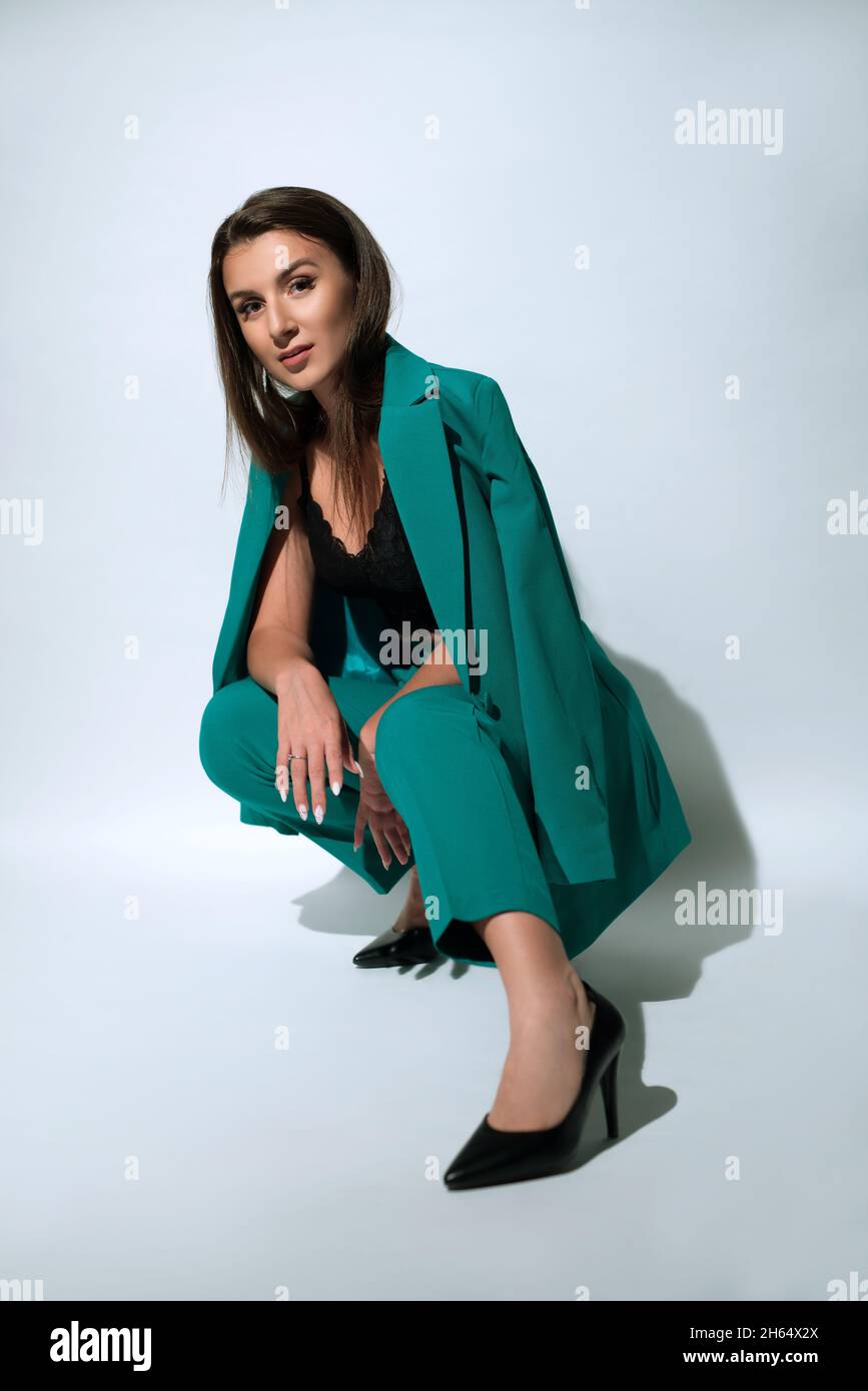 Stylish woman in blazer and high heels Stock Photo
