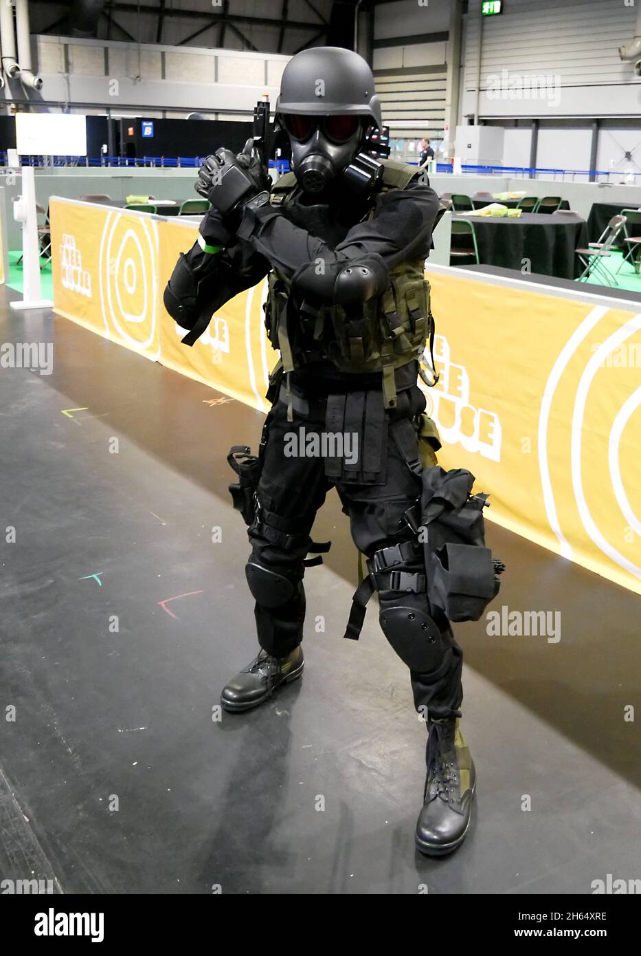 Birmingham, UK. 13th Nov, 2021. Grey, also known as grey0451, dressed Hunk  from the video game Resident Evil during the MCM Comic Con, held at the NEC  Birmingham on Saturday November 13th,