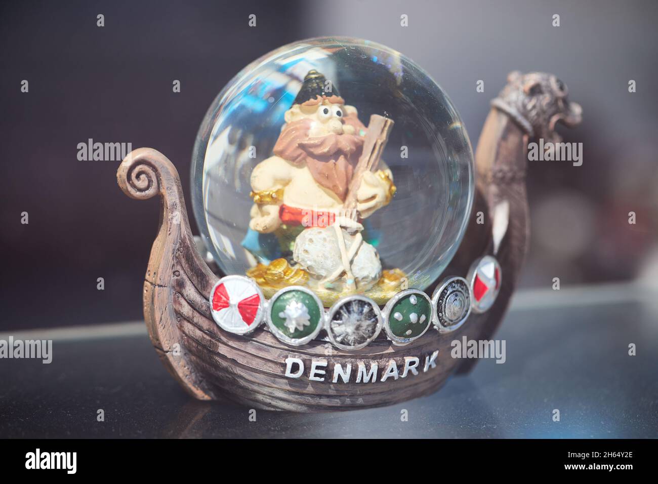 Glass sphere ornament with viking and viking ship, inscribed 'Denmark' Stock Photo