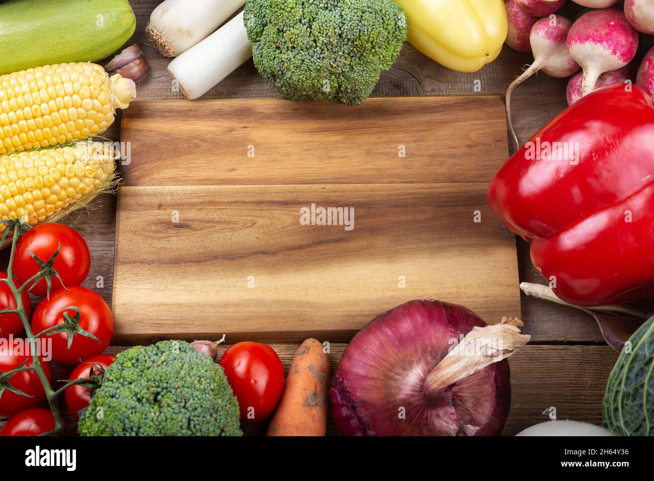 Healthy eating. Vegetables on a white wooden table. Organic food frame ...
