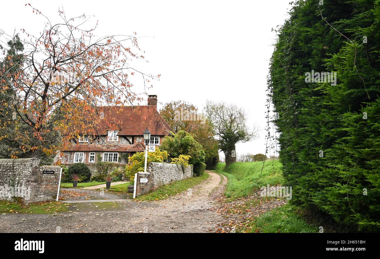 Chichester UK 13th November - Mill Cottage in Mill Lane at Halnaker near Chichester in West Sussex UK : Credit Simon Dack / Alamy Live News Stock Photo