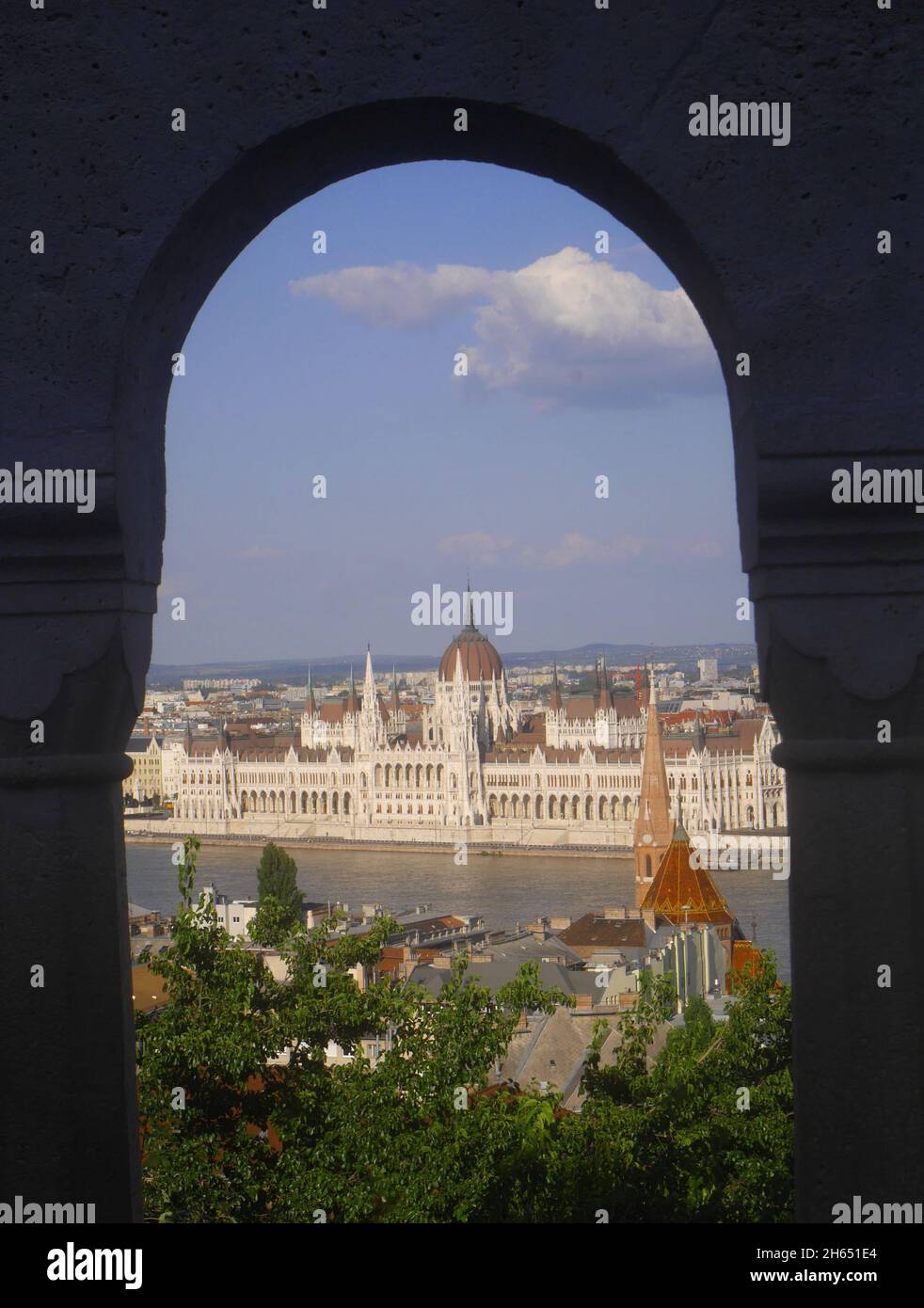 Hungarian Parliament from the halaszbastya (Fisherman’s Bastion), across the River Danube, Budapest, Hungary. Budapest is a UNESCO World Heritage site Stock Photo