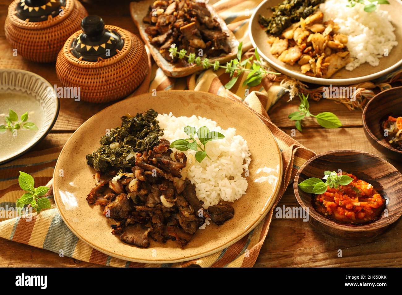 Se'i Sapi. Smoked beef dish from Nusa Tenggara Timur, served with rice and cassava leaves Stock Photo
