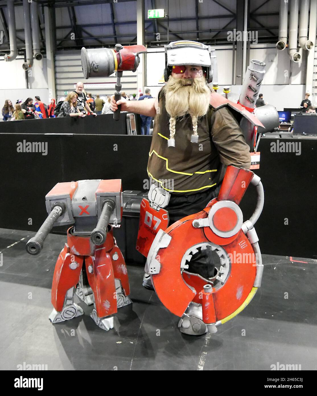Birmingham, UK. 13th Nov, 2021. Cosplayer dressed as Torbjörn from the video game OverWatch during the MCM Comic Con, held at the NEC Birmingham on Saturday November 13th, 2021. Photo credit should read: James Warwick/Alamy Live. Credit: James Warwick/Alamy Live News Stock Photo