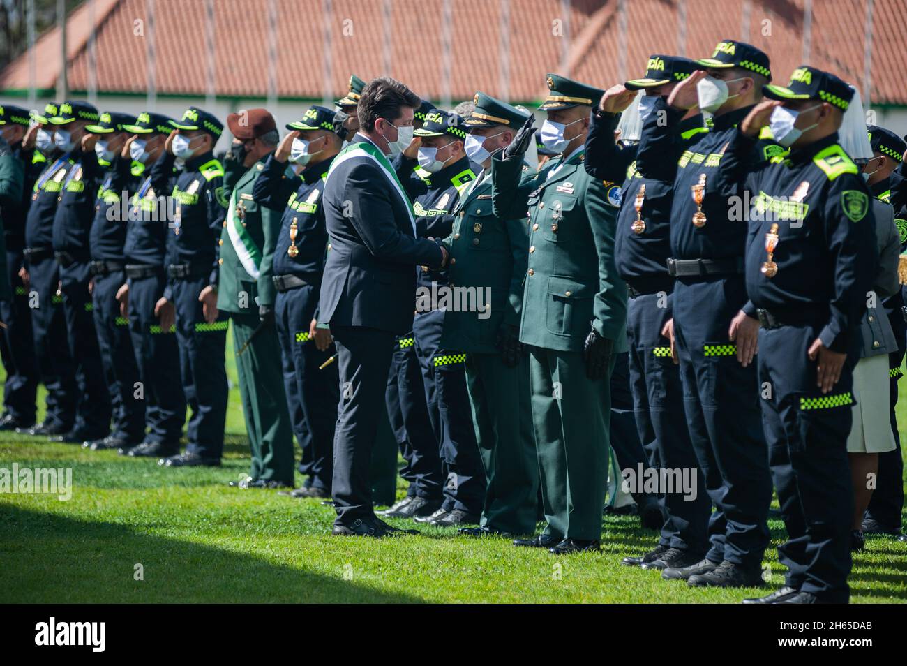 Colombia's Police officers that participated in the arrest of 'Otoniel' leader of the Gulf Clan (Clan del Golfo) receive a condecoration during an eve Stock Photo