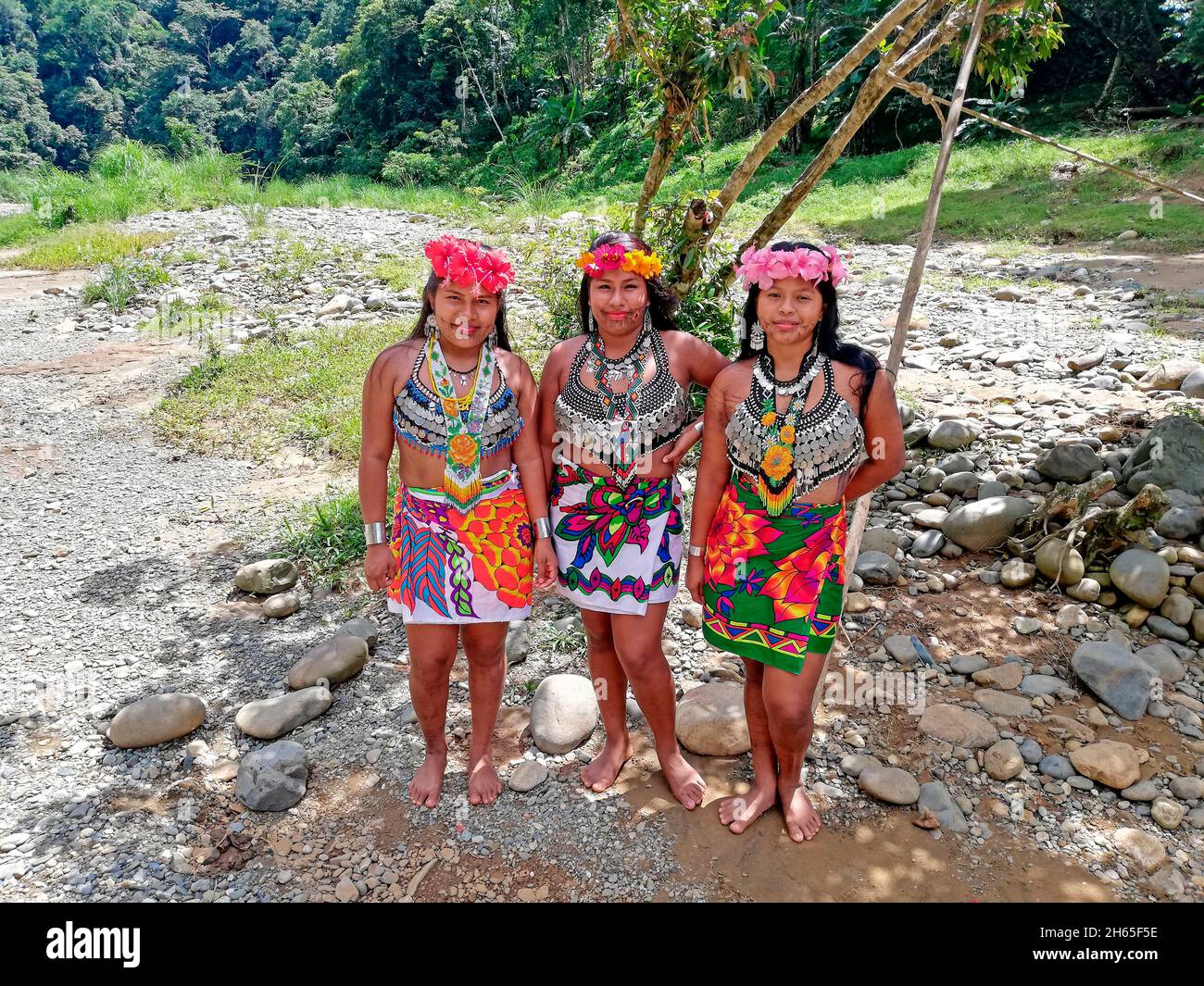 Young girls of the Embera tribe dressed in their traditional way. They're indigenous people who live in Panama in Central America, and Colombia. Stock Photo