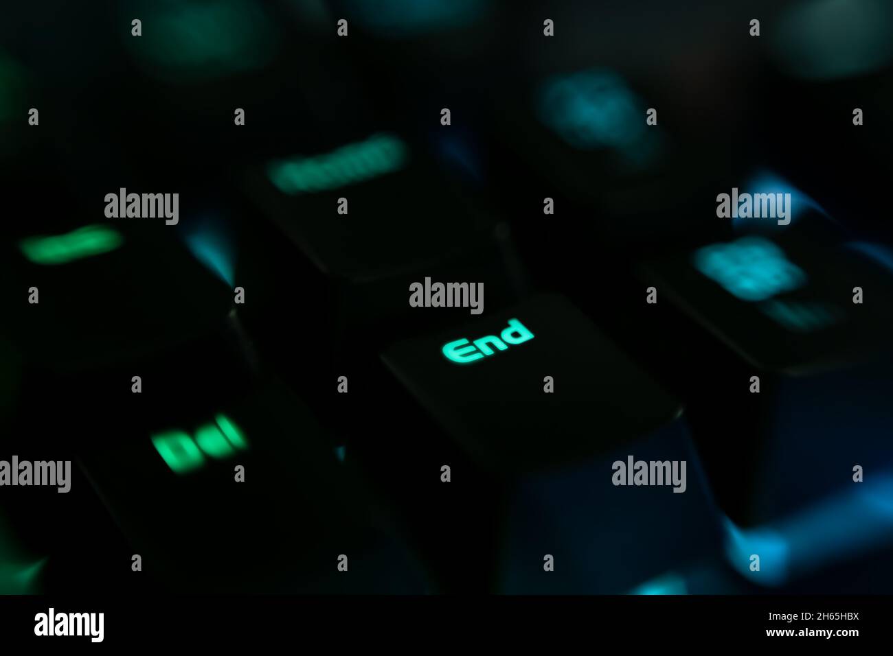 Gaming keyboard with LED backlit. Realistic computer keyboard.The End