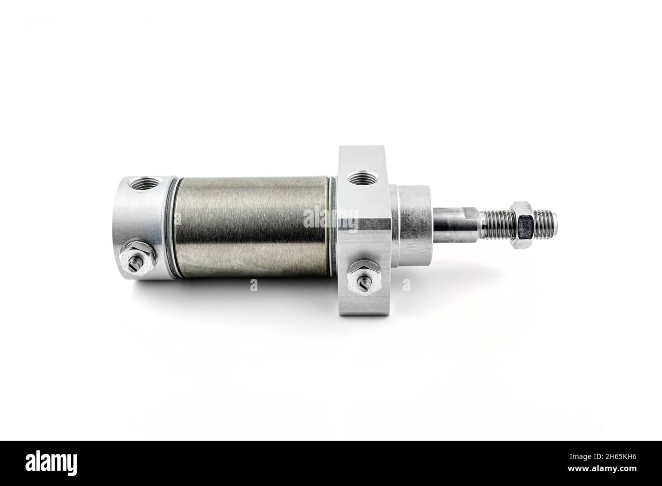 Closeup photo of a pneumatic air cylinder with a thread and nut on the