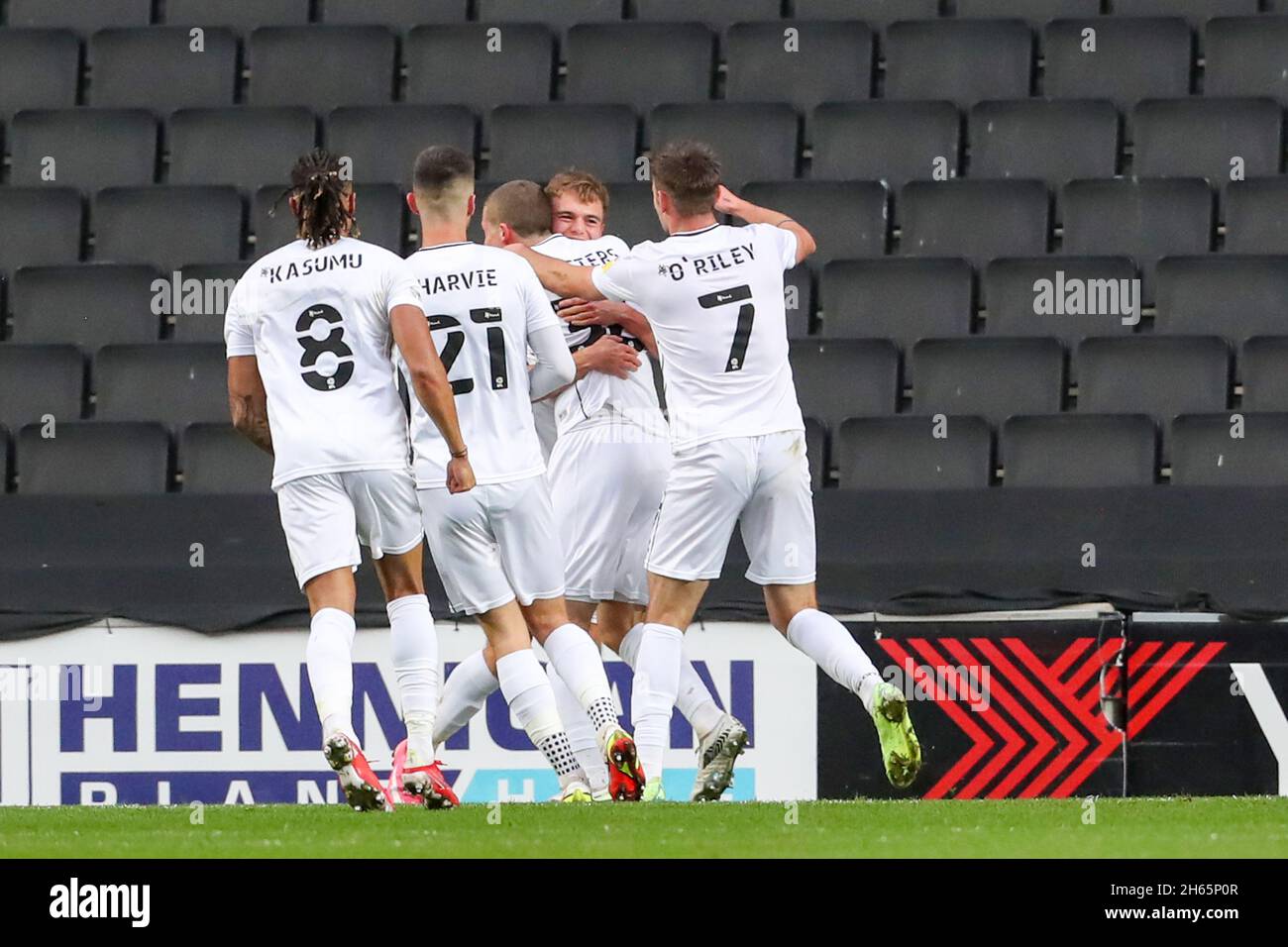 MILTON KEYNES, UK. NOV 13TH Scott Twine celebrates with team mates after scoring for Milton Keynes Dons, to take the lead making it 1 - 0 against Cambridge United, during the Sky Bet League 1 match between MK Dons and Cambridge United at Stadium MK, Milton Keynes on Saturday 13th November 2021. (Credit: John Cripps | MI News) Credit: MI News & Sport /Alamy Live News Stock Photo