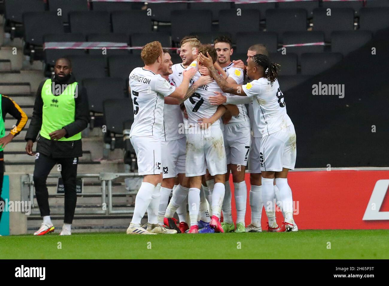 MILTON KEYNES, UK. NOV 13TH Scott Twine celebrates with team mates after scoring for Milton Keynes Dons, to extend their lead making it 3 - 0 against Cambridge United, during the Sky Bet League 1 match between MK Dons and Cambridge United at Stadium MK, Milton Keynes on Saturday 13th November 2021. (Credit: John Cripps | MI News) Credit: MI News & Sport /Alamy Live News Stock Photo