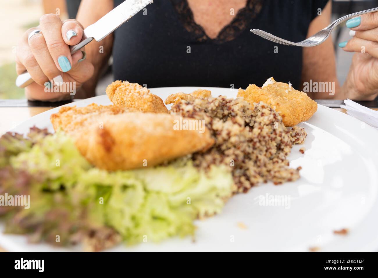 Woman Cleaning Silverware Stock Photo - Download Image Now