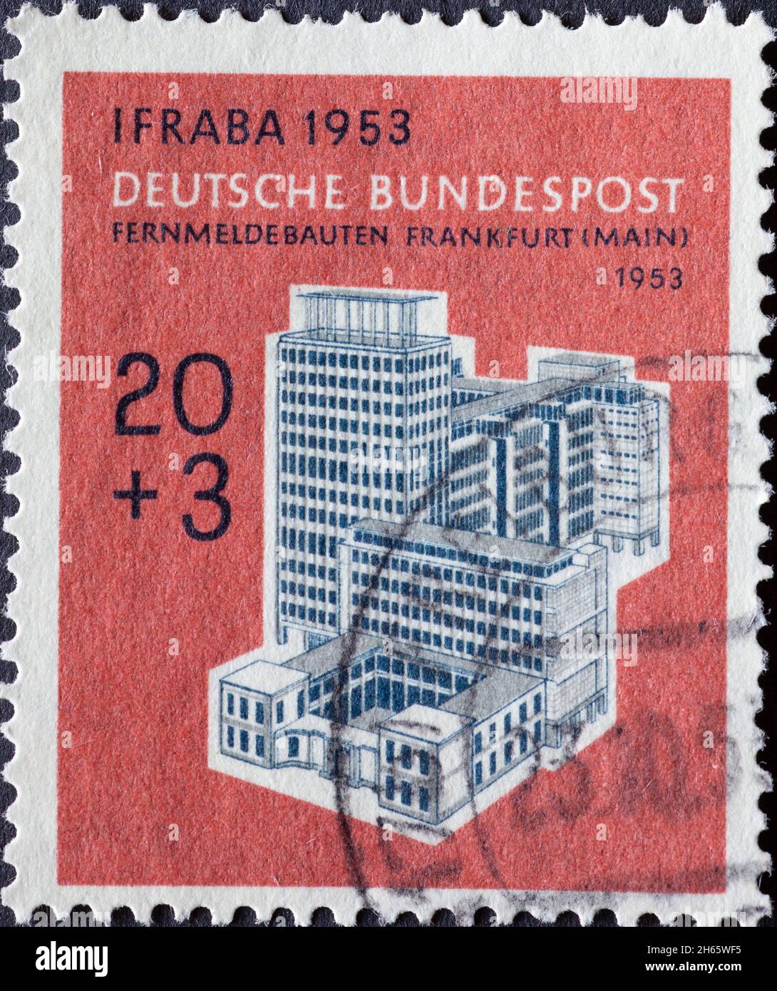 GERMANY - CIRCA 1951The telephone company building in Frankfurt (river Main) Germany 1953 can be seen on this postage stamp printed in Germany. The po Stock Photo