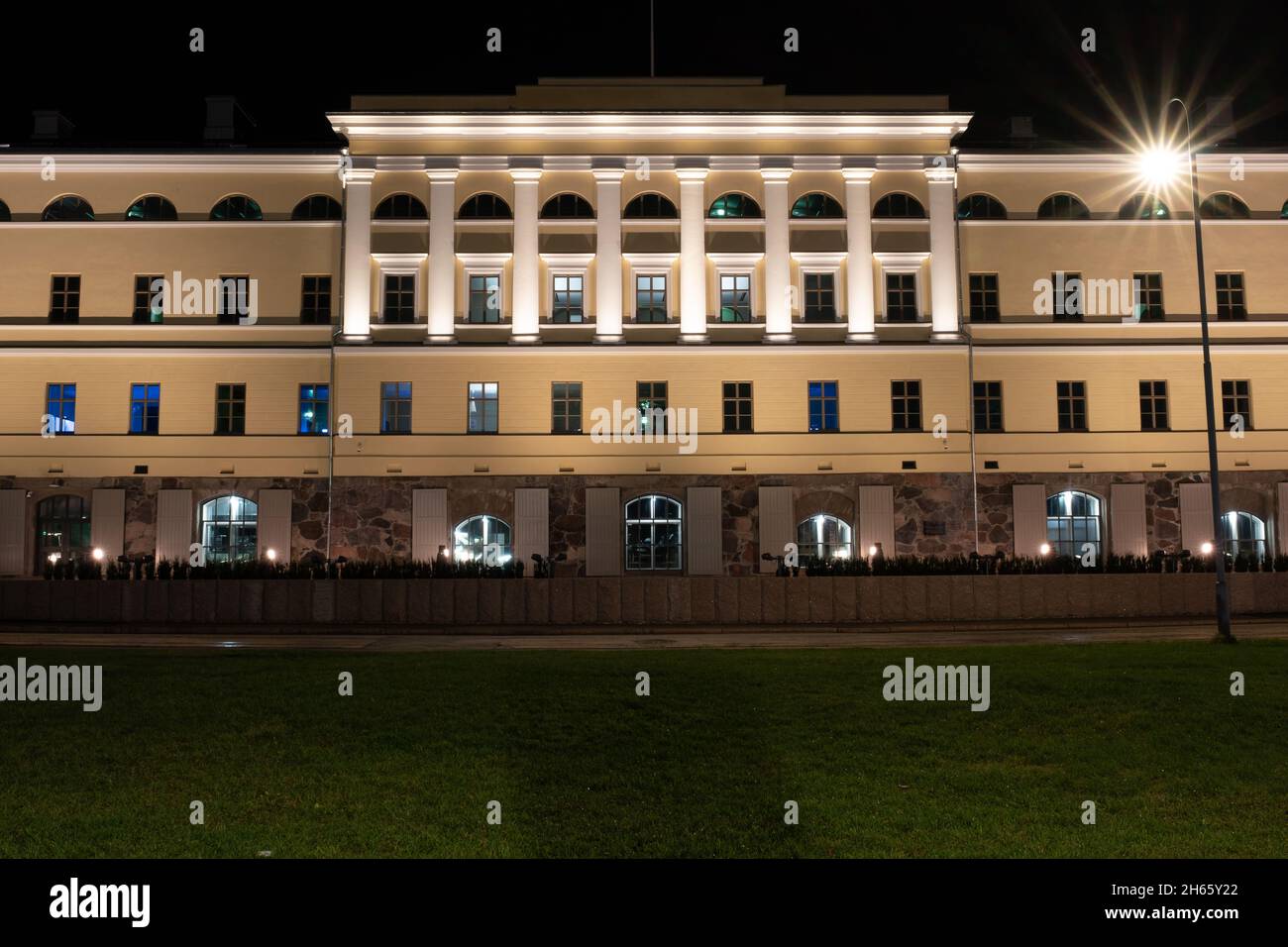 Helsinki / Finland - NOVEMBER 12, 2021: Renovated building exterior of Finnish ministry for foreign affairs illuminated during the nighttime Stock Photo