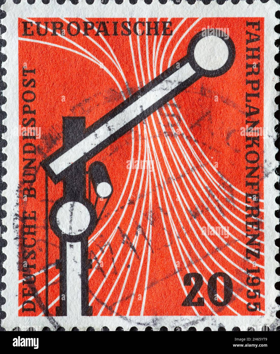 GERMANY - CIRCA 1955:This postage stamp shows a railway signal against a red background. The reason for this postage stamp was the 1955 European Timet Stock Photo