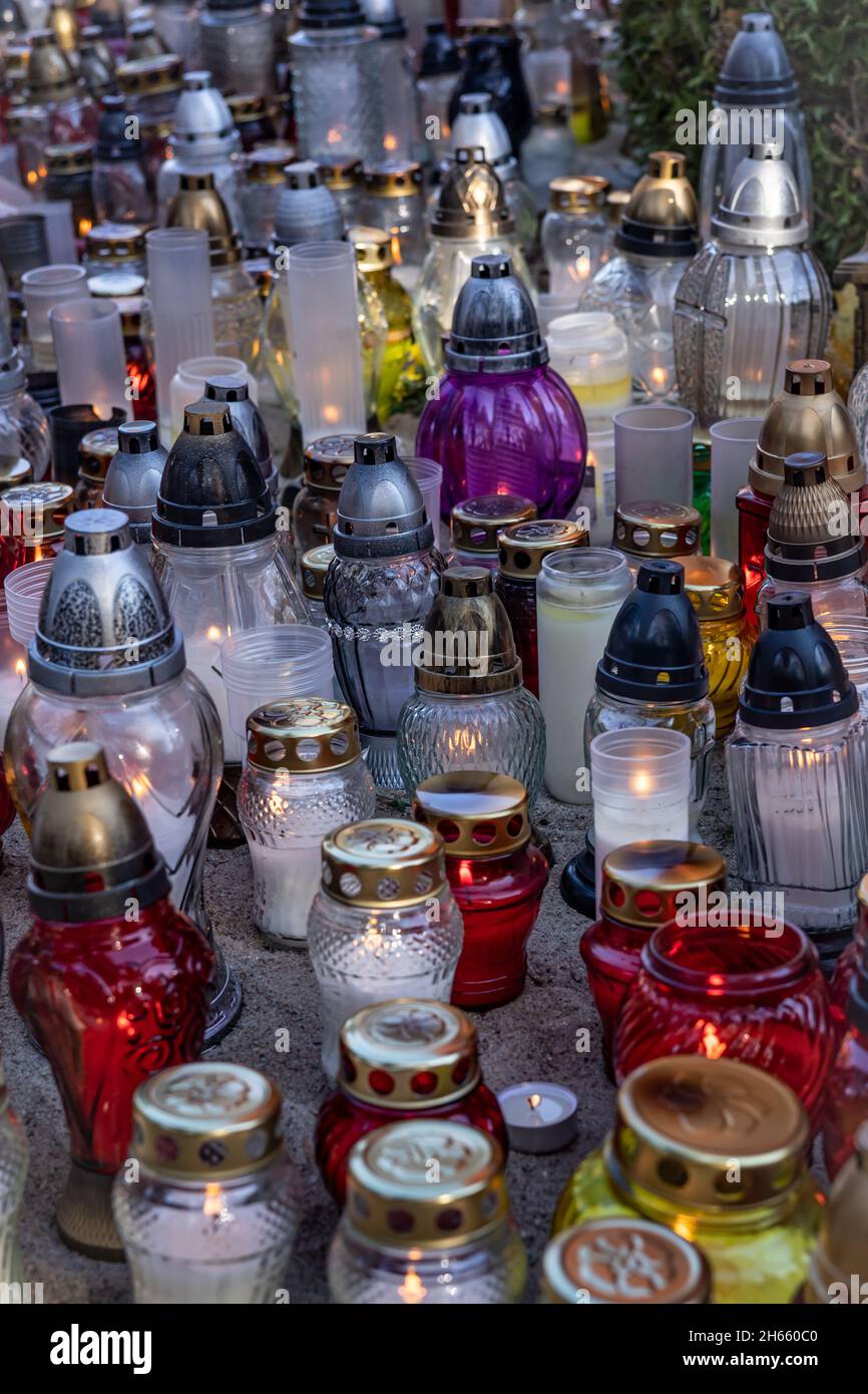 Colorful memorial candle lights burning at the cemetery Stock Photo Alamy
