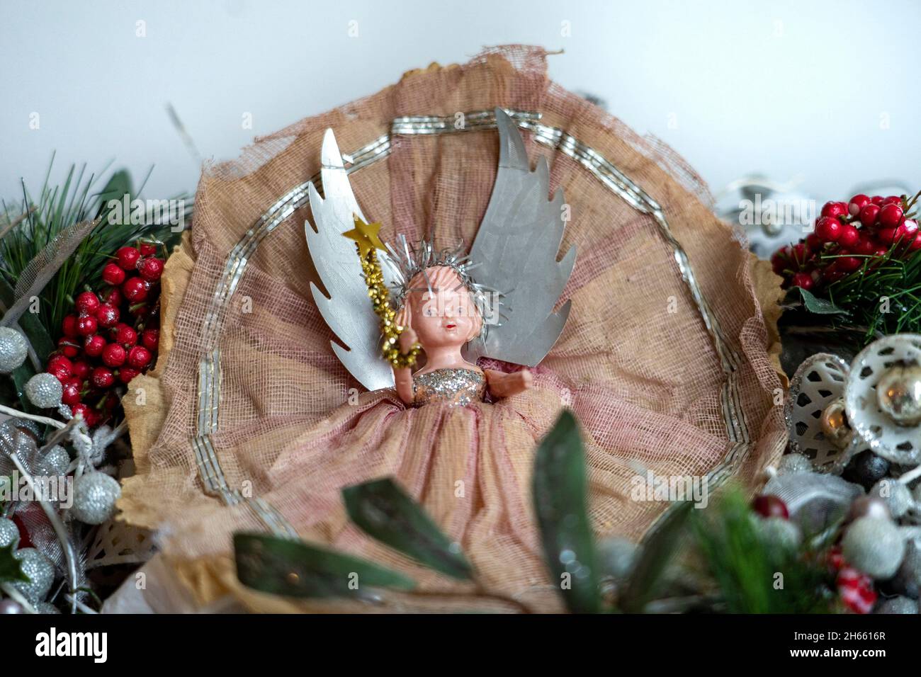 Vintage1950s Dibro Christmas Tree Fairy on a handmade wreath Stock Photo