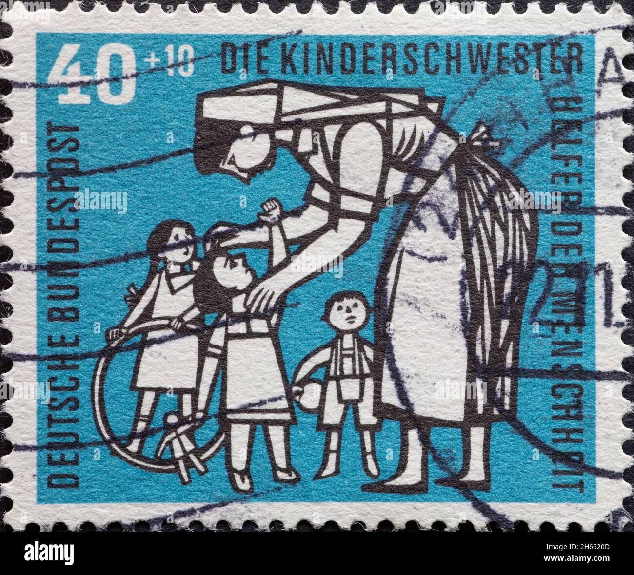 GERMANY CIRCA 1956 This postage stamp in brown shows a pediatric
