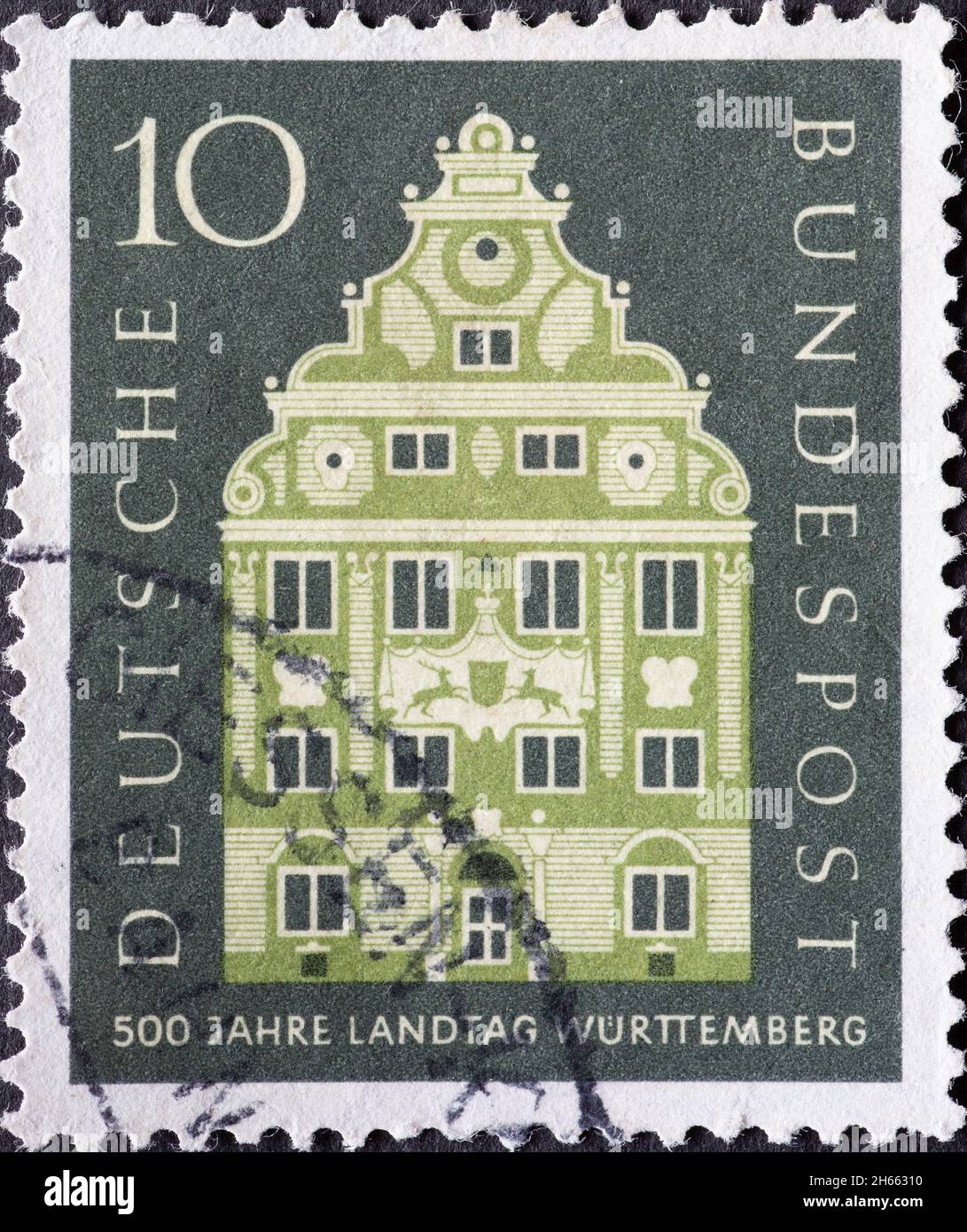 GERMANY - CIRCA 1957: This postage stamp shows the facade of the landscape house in Stuttgart, destroyed in 1944. Text: 500 years Landtag Würtemberg Stock Photo