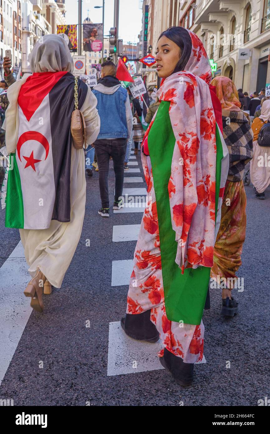 Madrid, Spain. 13th Nov, 2021. Protesters march on the street during the demonstration.Activists held a protest against the human rights abuses against the Saharawi people and to call for the 'liberation of Western Sahara' in Gran Via Street in Madrid, Spain. (Photo by Atilano Garcia/SOPA Images/Sipa USA) Credit: Sipa USA/Alamy Live News Stock Photo