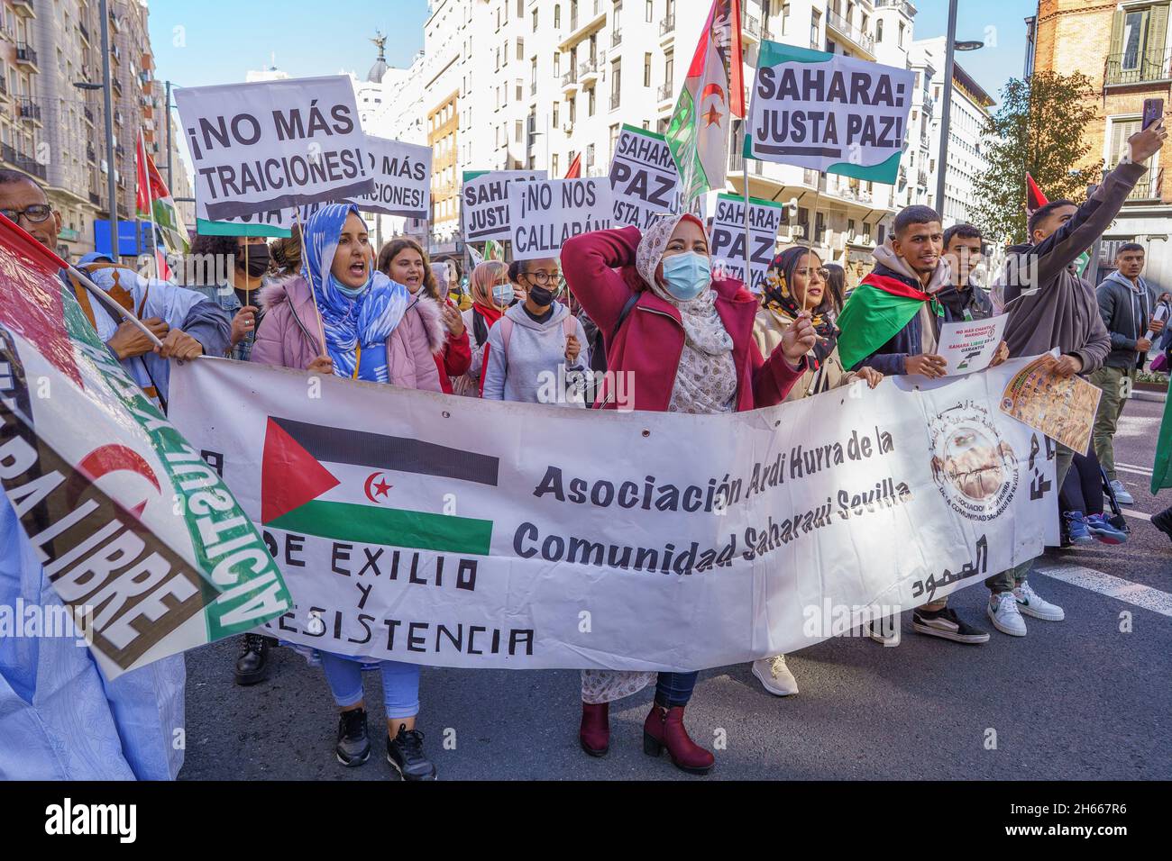 Madrid, Spain. 12th June, 2021. Protesters hold placards and a banner in defense of the Sahrawi people during a demonstration.Activists held a protest against the human rights abuses against the Saharawi people and to call for the ''liberation of Western Sahara'' in Gran Via Street in Madrid, Spain. (Credit Image: © Atilano Garcia/SOPA Images via ZUMA Press Wire) Stock Photo