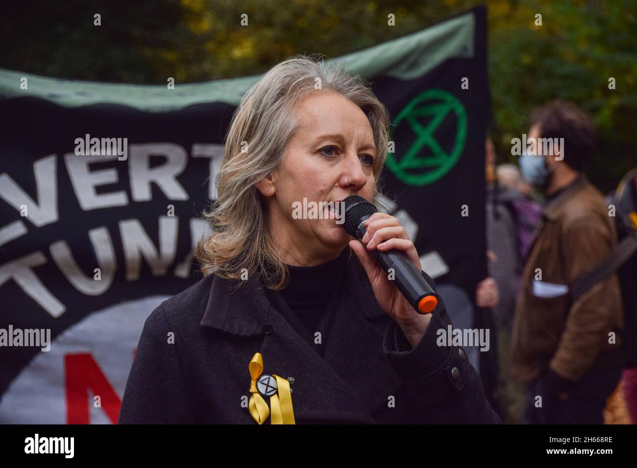 London, UK. 13th November 2021. Extinction Rebellion co-founder Gail Bradbrook speaks at Lincoln's Inn Fields. Extinction Rebellion demonstrators marched through the City of London, disrupting the Lord Mayor's Show in protest against the 'failure' of COP26. Credit: Vuk Valcic / Alamy Live News Stock Photo