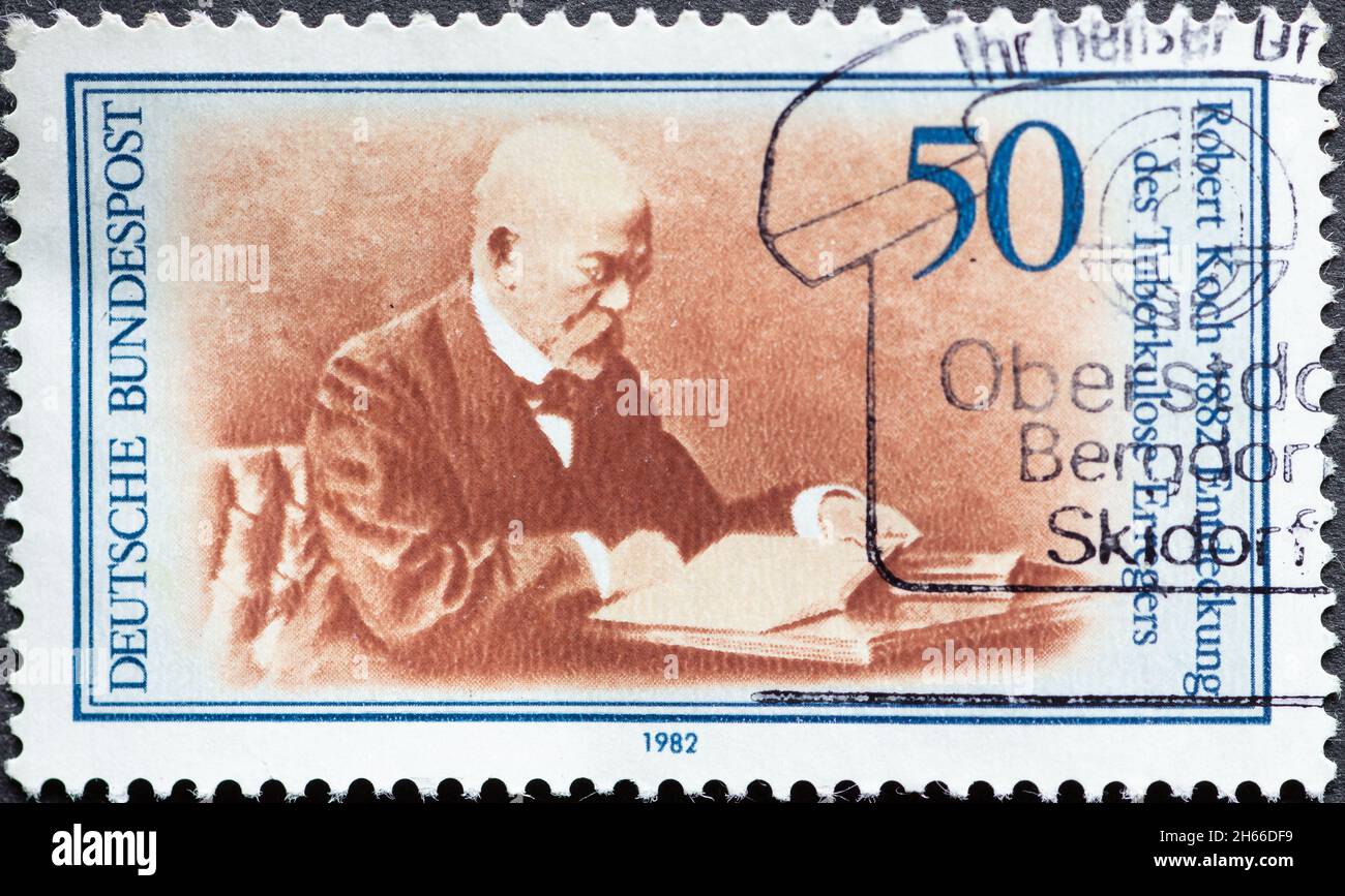 GERMANY - CIRCA 1982: a postage stamp from Germany, showing a portrait of Robert Koch, discoverer of the tuberculosis pathogen. Mycobacterium tubercul Stock Photo