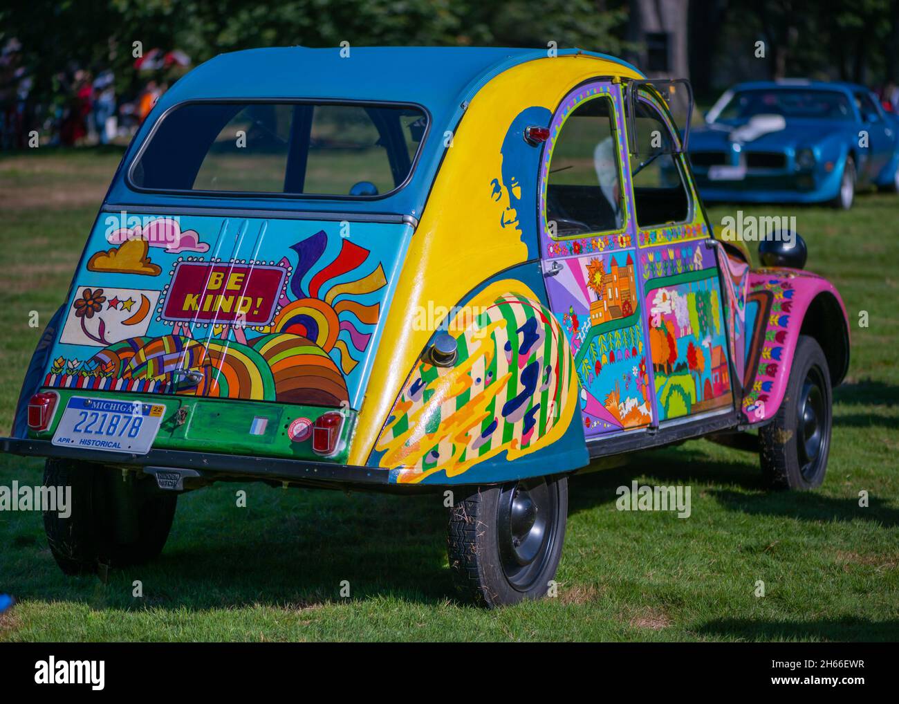 GROSSE POINTE SHORES, MI/USA - SEPTEMBER 19, 2021: A 1961 Citroen 2 CV Psychedelic 'Be Kind' Art car, EyesOn Design car show, near Detroit, Michigan. Stock Photo