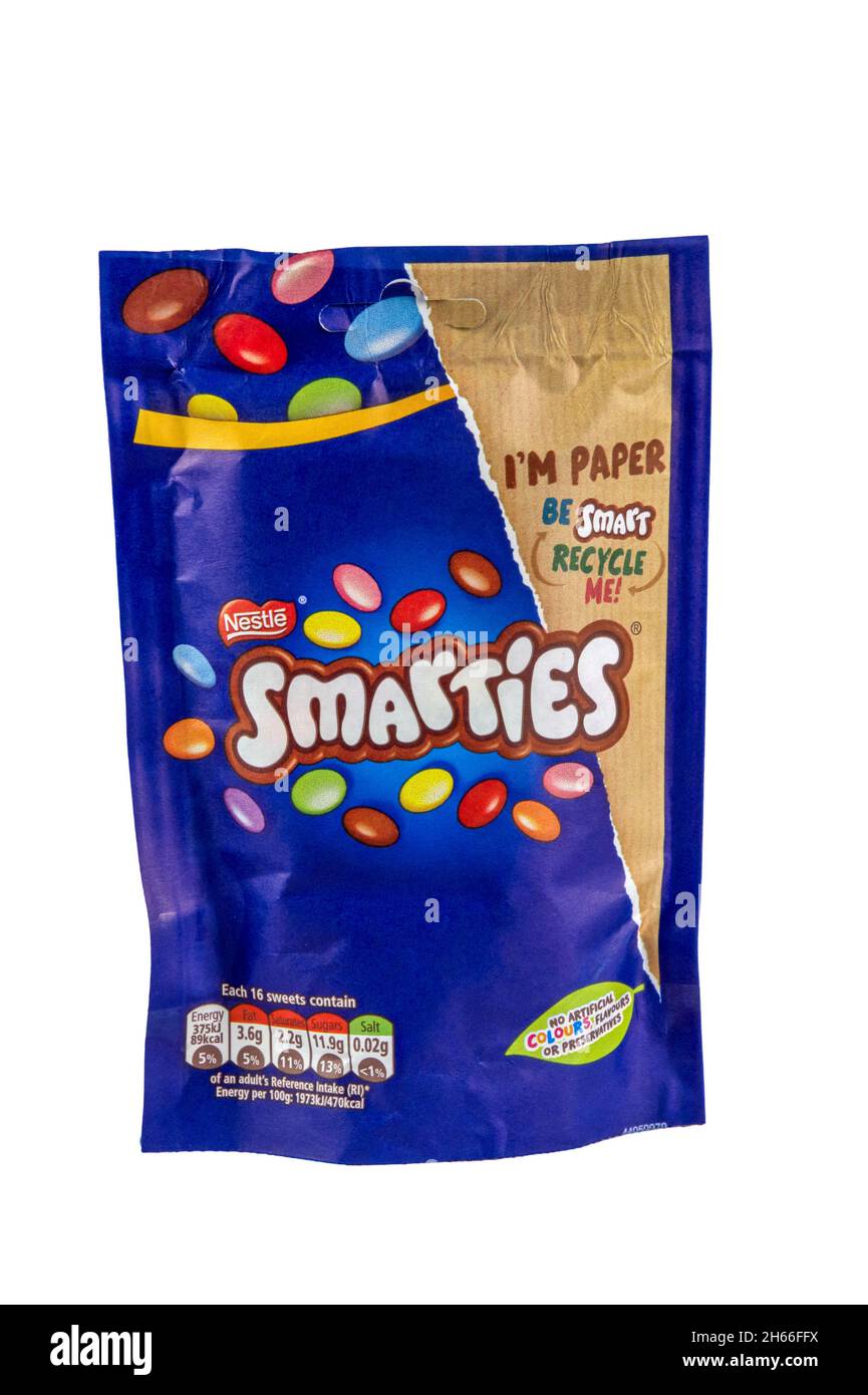A recyclable paper bag of Smarties chocolate covered sweets made by Nestlé. Stock Photo