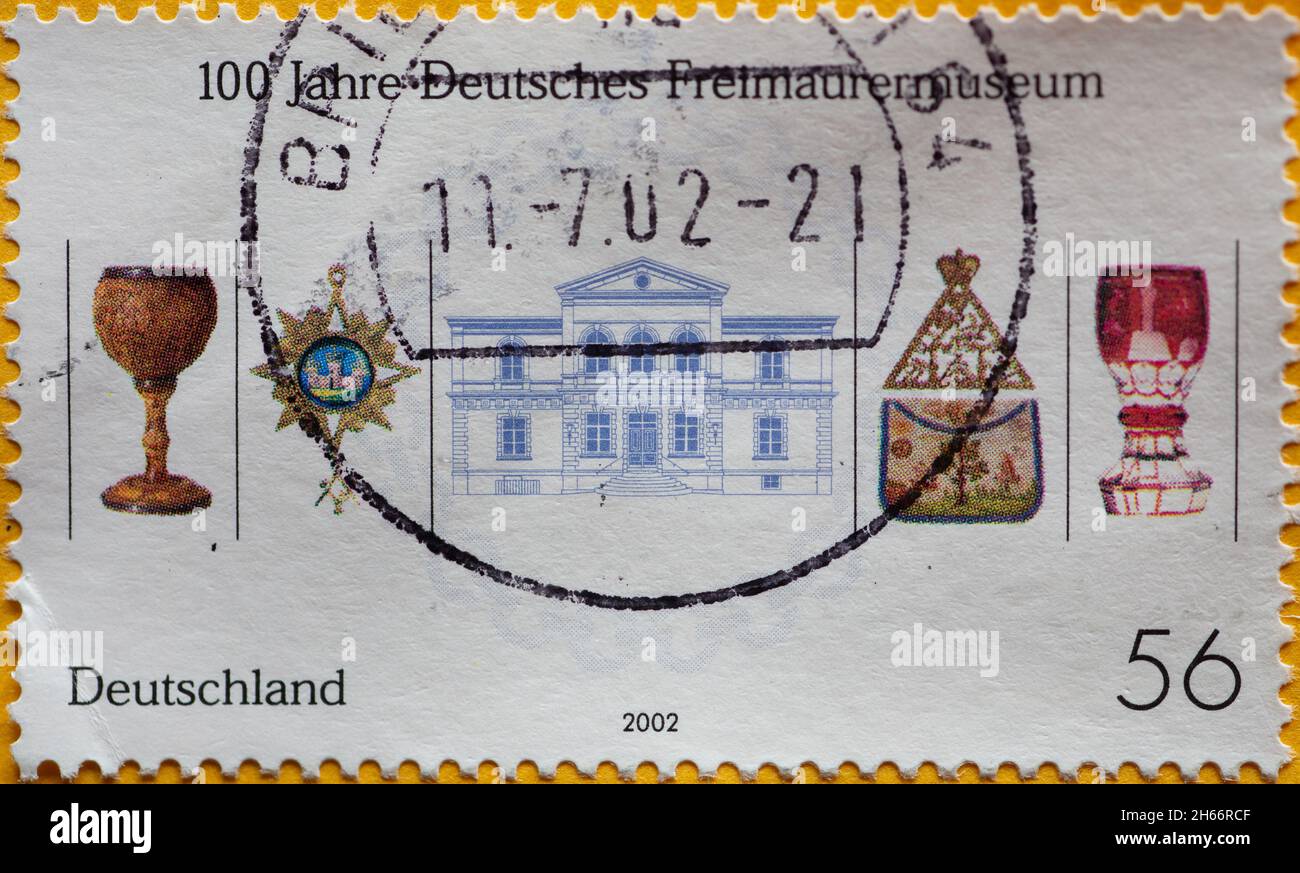 GERMANY - CIRCA 2002 : a postage stamp from Germany, showing some symbols of the Freemasons. Occasion: 100 years of the German Freemasons Museum, Bayr Stock Photo