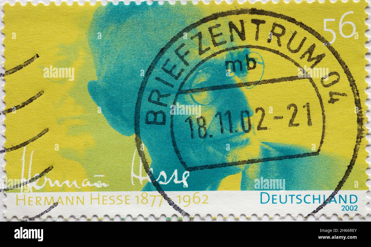 GERMANY - CIRCA 2002 : a postage stamp from Germany, showing a portrait of the writer, poet and painter Hermann Hesse for his 125th birthday Stock Photo