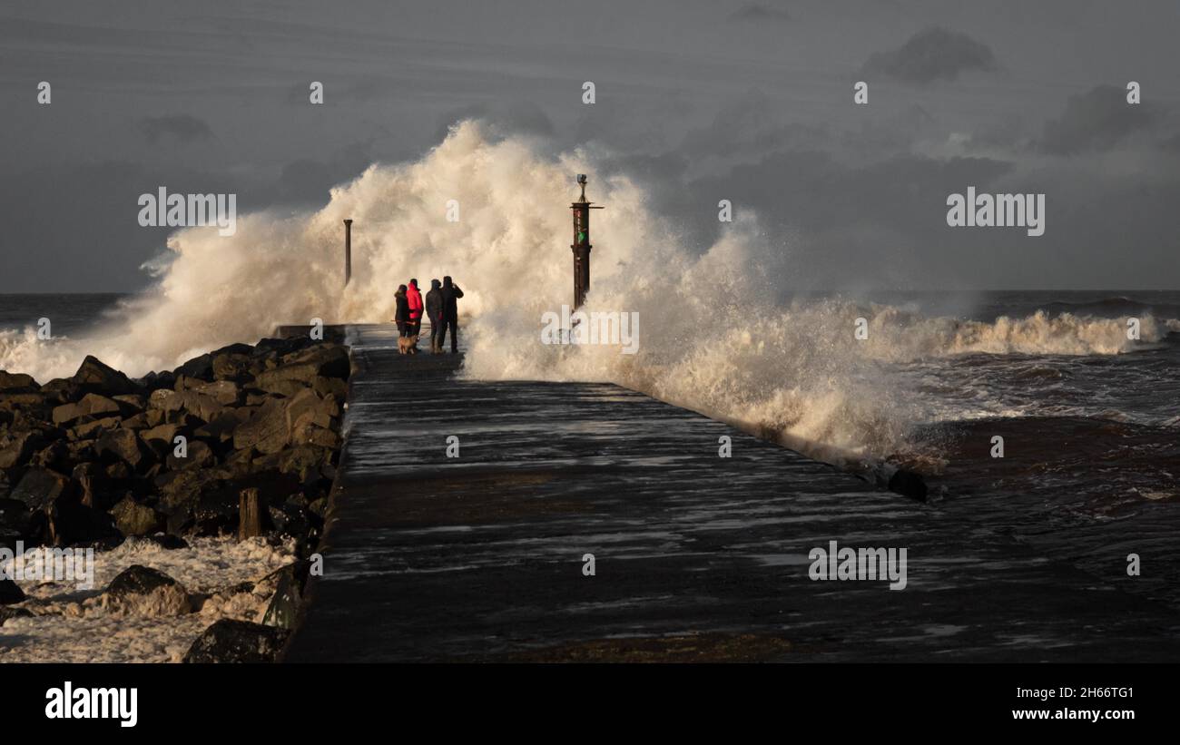 Storm Clara hits the Northern Irish coastline at Castlerock, crashing waves engulf pier. Stock Photo