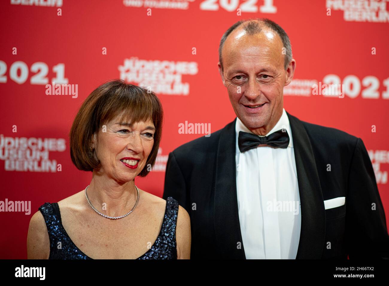 Berlin, Germany. 13th Nov, 2021. Friedrich Merz (CDU), politician, and his wife Charlotte Merz stand at the press wall at the award ceremony for the 'Prize for Understanding and Tolerance'. The prize goes to the President of the Jewish Community of Munich and Upper Bavaria Knobloch and the architect Libeskind. Stephan Habrath, President of the Federal Constitutional Court, Daniella Luxembourg, art dealer, Credit: Fabian Sommer/dpa/Alamy Live News Stock Photo