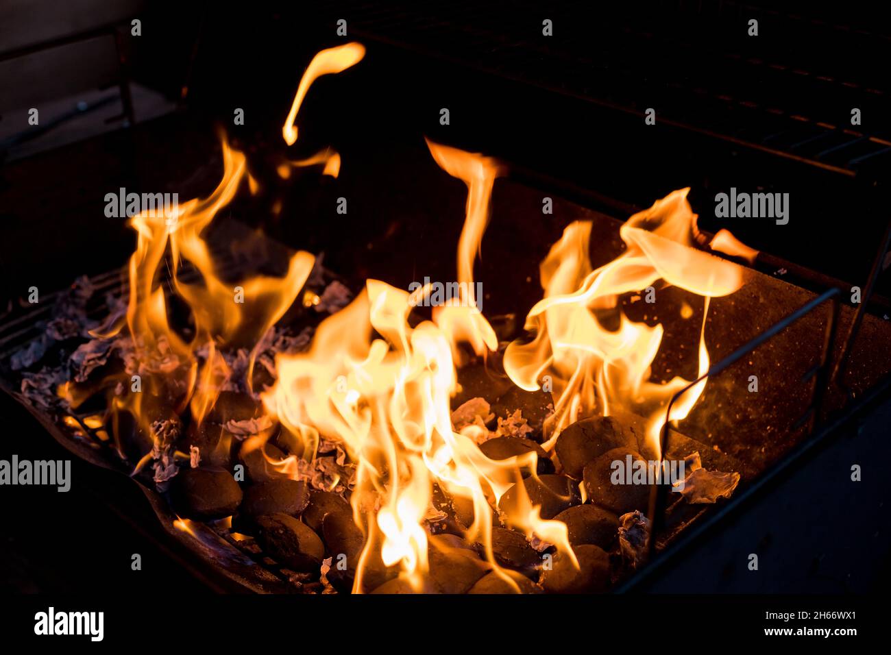 Fire flames with reflection on black background Stock Photo