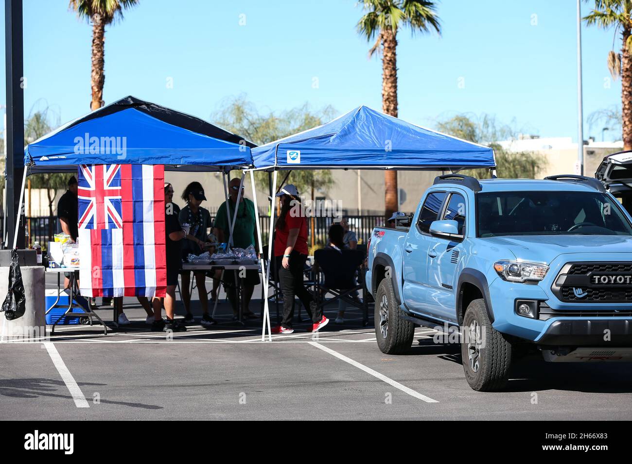 November 13, 2021: Hawaii Warriors fans gather in the parking lot prior to the start of the NCAA football game featuring the Hawaii Warriors and the UNLV Rebels at Allegiant Stadium in Las Vegas, NV. Christopher Trim/CSM/Sipa USA.(Credit Image: &copy; Christopher Trim/CSM/Sipa USA) Stock Photo
