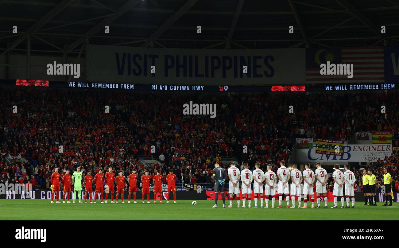 Cardiff, Wales, 13th November 2021. The Wales and Belarus teams observe a minutes silence to recognise Remembrance Day  during the FIFA World Cup 2022 - European Qualifying match at the Cardiff City Stadium, Cardiff. Picture credit should read: Darren Staples / Sportimage Credit: Sportimage/Alamy Live News Stock Photo