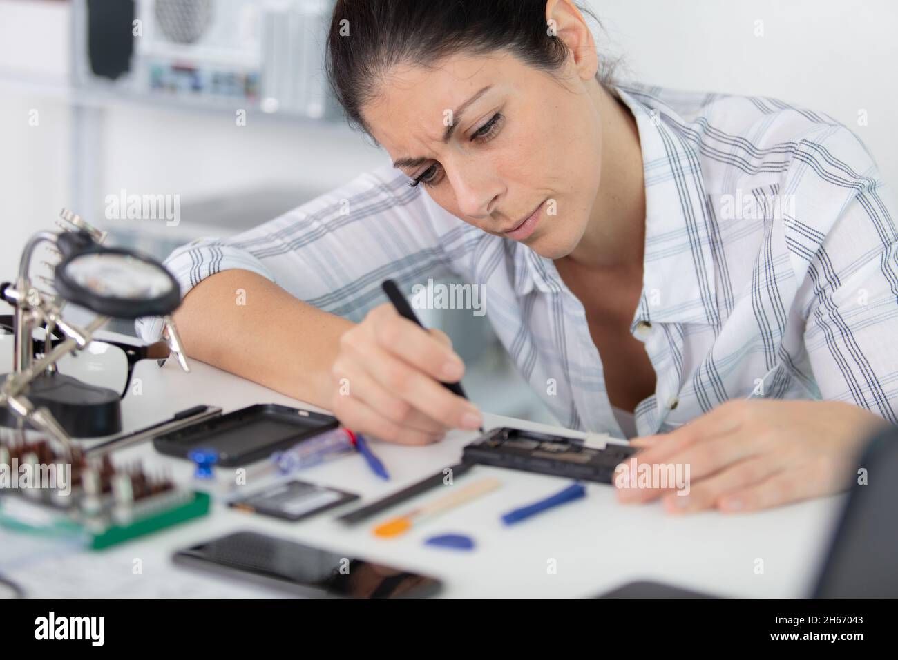 happy and successful female computer technician Stock Photo