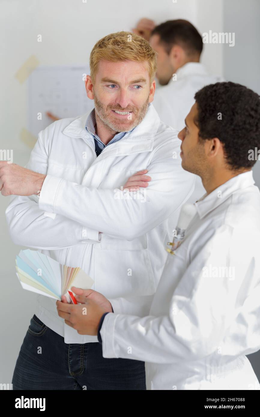 portrait of painter with apprentice Stock Photo
