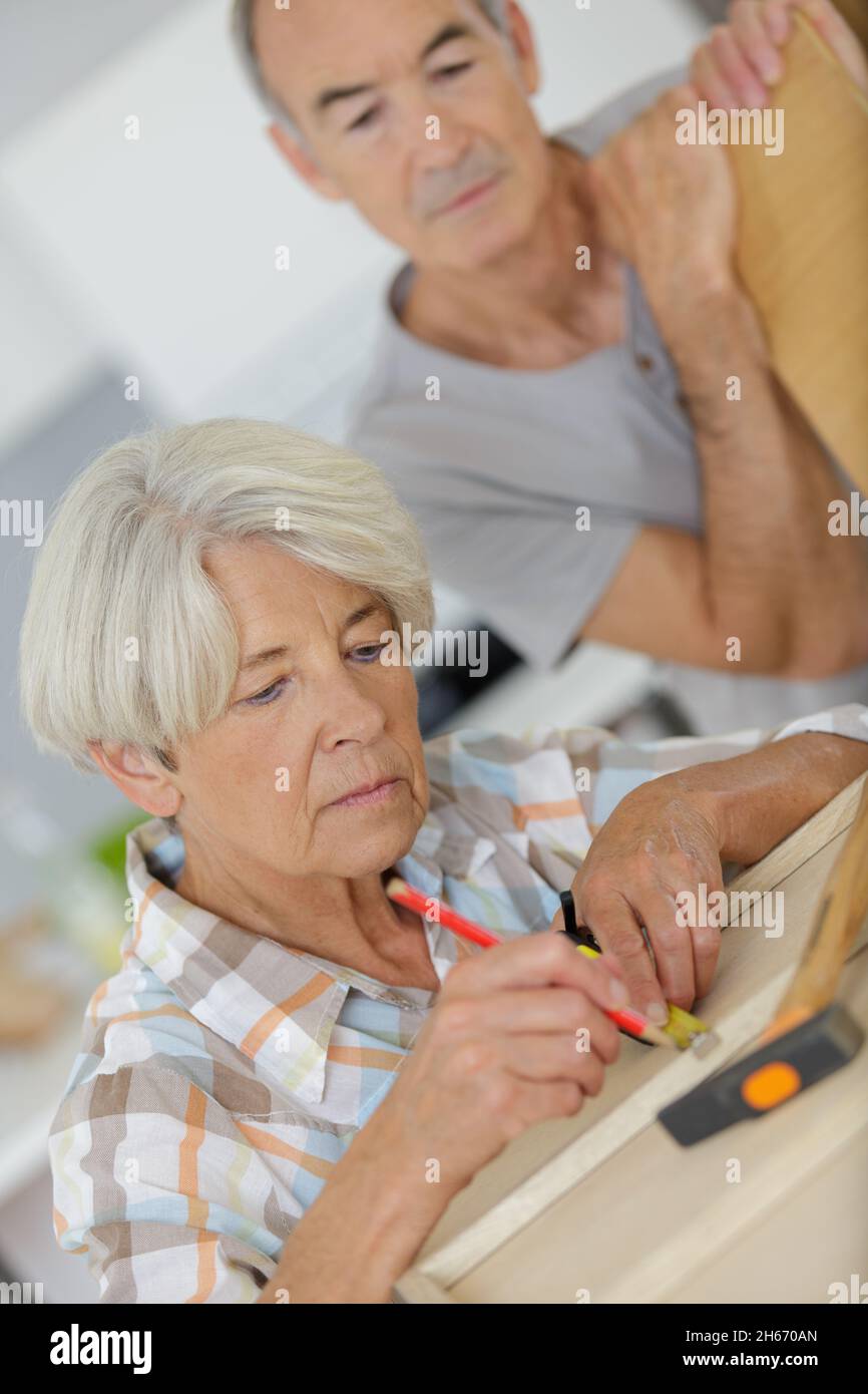 senior couple doing diy at home Stock Photo