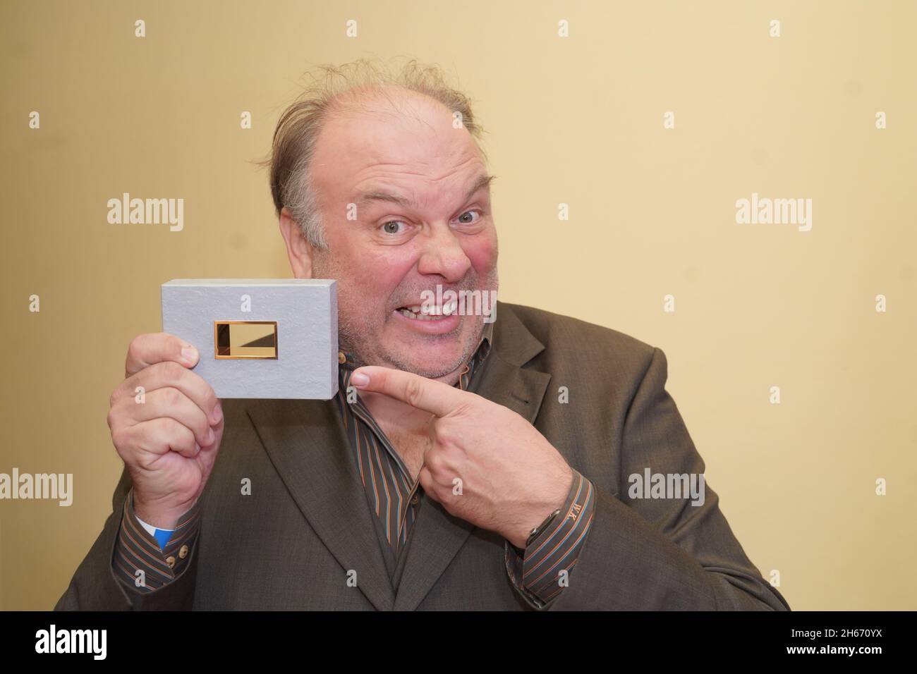 Berlin, Germany. 13th Nov, 2021. Actor Waldemar Kobus receives an award in the category 'Supporting Role' at the DAfF (German Academy for Television) awards ceremony at the Babylon cinema. Credit: Jörg Carstensen/dpa/Alamy Live News Stock Photo