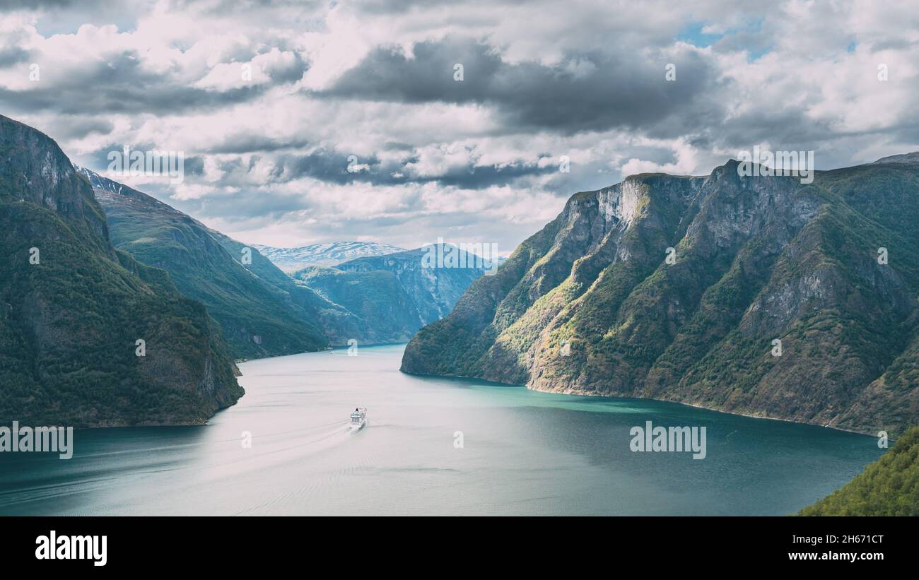 Aurland, Sogn And Fjordane Fjord, Norway. Amazing Summer Scenic View Of Sogn Og Fjordane. Ship Or Ferry Boat Liner Floating In Famous Norwegian Stock Photo