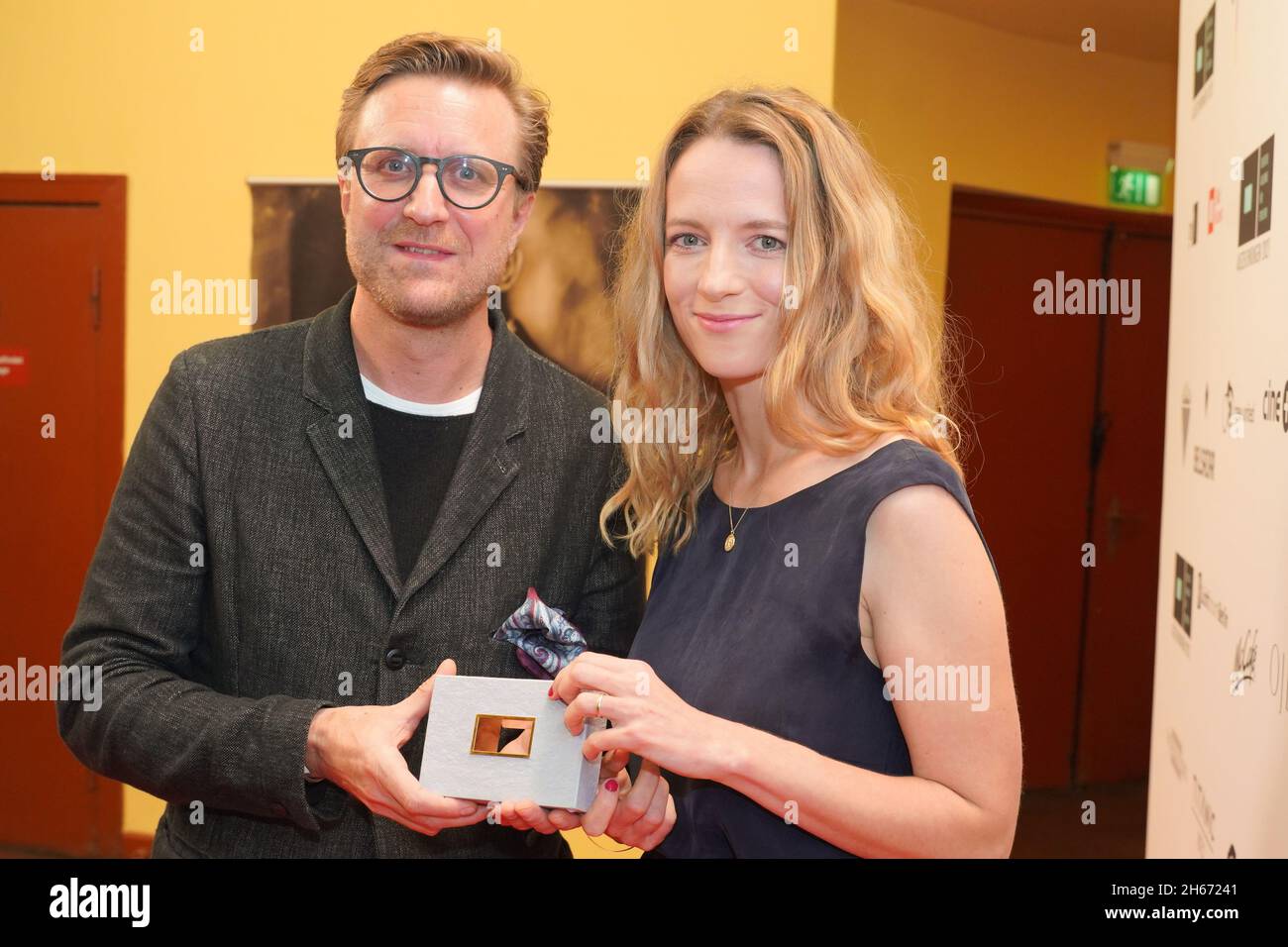 Berlin, Germany. 13th Nov, 2021. Carl Gierstorfer and Mareike Müller receive an award in the category 'Documentary Film' at the DAfF (German Academy for Television) awards ceremony at the Babylon cinema. Credit: Jörg Carstensen/dpa/Alamy Live News Stock Photo